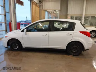 2009 Nissan Versa 1.8 S with VIN 3N1BC13E69L386083, listed as a IAAI auction lot 41717999 with 99,511 mi miles. Bid and sale history available at carsss.com. Image 15.