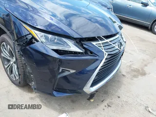 2019 Lexus RX 350 z VIN 2T2BZMCAXKC185818, wystawiony jako IAAI lot #42308783 z przebiegiem 45 708 mil mil oraz . Historia ofert i sprzedaży dostępna na DreamBid. Obrazek 18.