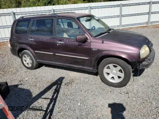 2003 Suzuki XL7 Touring z VIN JS3TY92V734100887, wystawiony jako Copart lot #80594514 z przebiegiem Nie podano mil oraz Szkoda całkowita • Salvage title. Historia ofert i sprzedaży dostępna na DreamBid. Obrazek 4.