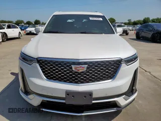 2024 Cadillac XT6 FWD Premium Luxury with VIN 1GYKPCRS7RZ711983, listed as a Copart auction lot 64842625 with 6,394 mi miles and Clean title. Bid and sale history available at DreamBid. Image 5.