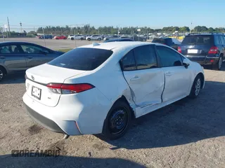 2024 Toyota Corolla LE with VIN 5YFB4MDE7RP218014, listed as a IAAI auction lot 41470209 with 10,877 mi miles. Bid and sale history available at carsss.com. Image 4.