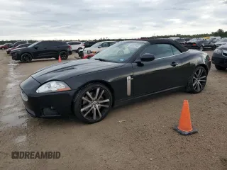 2007 Jaguar XK with VIN SAJWA44C879B19251, listed as a Copart auction lot 50807595 with 100,715 mi miles and Salvage Title. Bid and sale history available at carsss.com. Image 1.