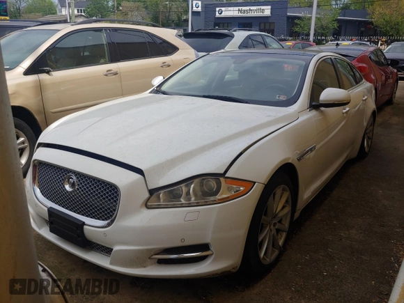 2013 Jaguar XJ с VIN SAJWJ1CD7D8V49599, выставлен на аукционе Copart как лот 54008915 с пробегом 133 163 миль миль и Чистый • Clean title. История ставок и продаж доступна на DreamBid. Изображение 2.