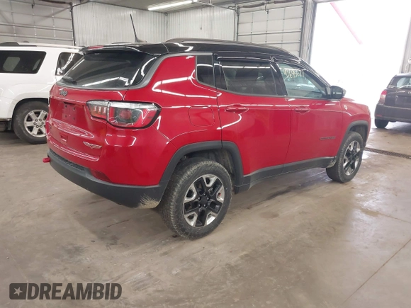 2018 Jeep Compass Trailhawk with VIN 3C4NJDDB7JT234551, listed as a IAAI auction lot 41695627 with 65,381 mi miles and . Bid and sale history available at carsss.com. Image 4.