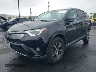 2018 Toyota RAV4 XLE with VIN 2T3WFREV3JW516867, listed as a IAAI auction lot 41765369 with 54,390 mi miles. Bid and sale history available at carsss.com. Image 2.