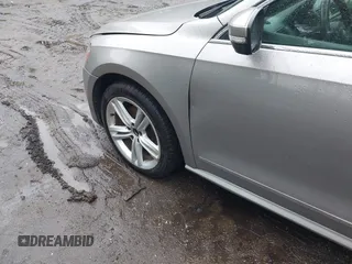2013 Volkswagen Passat SEL Premium z VIN 1VWCN7A37DC045616, wystawiony jako IAAI lot #42381835 z przebiegiem 130 535 mil mil oraz . Historia ofert i sprzedaży dostępna na DreamBid. Obrazek 6.