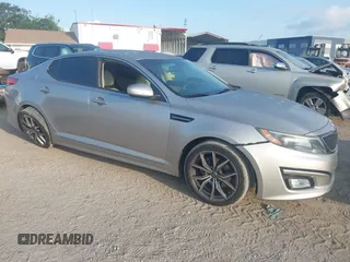 2015 Kia Optima LX z VIN 5XXGM4A72FG456014, wystawiony jako IAAI lot #42308313 z przebiegiem 191 847 mil mil oraz . Historia ofert i sprzedaży dostępna na DreamBid. Obrazek 1.