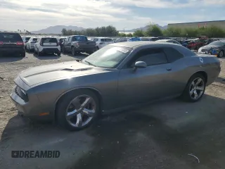 2012 Dodge Challenger R/T z VIN 2C3CDYBT2CH268592, wystawiony jako Copart lot #53143395 z przebiegiem 101 390 mil mil oraz Szkoda całkowita • Salvage title. Historia ofert i sprzedaży dostępna na DreamBid. Obrazek 1.