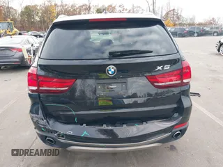 2016 BMW X5 sDrive35i with VIN 5UXKR2C59G0U17661, listed as a IAAI auction lot 40931088 with 90,963 mi miles. Bid and sale history available at carsss.com. Image 16.