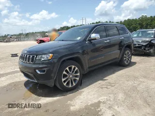 2018 Jeep Grand Cherokee Sterling z VIN 1C4RJEBG4JC241944, wystawiony jako Copart lot #61679565 z przebiegiem 83 480 mil mil oraz Szkoda całkowita • Salvage title. Historia ofert i sprzedaży dostępna na DreamBid. Obrazek 1.