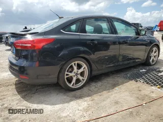 2015 Ford Focus Titanium with VIN 1FADP3J28FL362590, listed as a Copart auction lot 59759495 with 58,644 mi miles and Clean title. Bid and sale history available at DreamBid. Image 3.