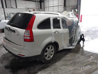 2011 Honda CR-V SE with VIN JHLRE4H49BC010599, listed as a IAAI auction lot 39483557 with 143,350 mi miles. Bid and sale history available at carsss.com. Image 4.