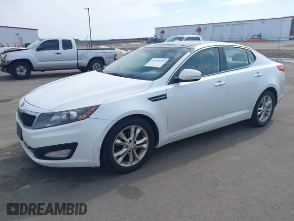 2013 Kia Optima EX with VIN 5XXGN4A7XDG111601, listed as a IAAI auction lot 41810208 with 192,767 mi miles. Bid and sale history available at carsss.com. Image 2.