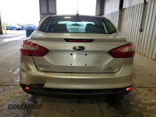 2013 Ford Focus SE z VIN 1FADP3F26DL314690, wystawiony jako Copart lot #58408575 z przebiegiem Nie podano mil oraz Szkoda całkowita • Salvage title. Historia ofert i sprzedaży dostępna na DreamBid. Obrazek 6.