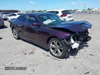 2021 Dodge Charger R/T with VIN 2C3CDXCTXMH603768, listed as a IAAI auction lot 41841121 with 19,272 mi miles and . Bid and sale history available at carsss.com. Image 1.