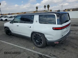 2025 Rivian R1S Adventure z VIN 7PDSGBBA1SN051768, wystawiony jako Copart lot #43838115 z przebiegiem 4875 mil mil oraz Szkoda całkowita • Salvage title. Historia ofert i sprzedaży dostępna na DreamBid. Obrazek 2.