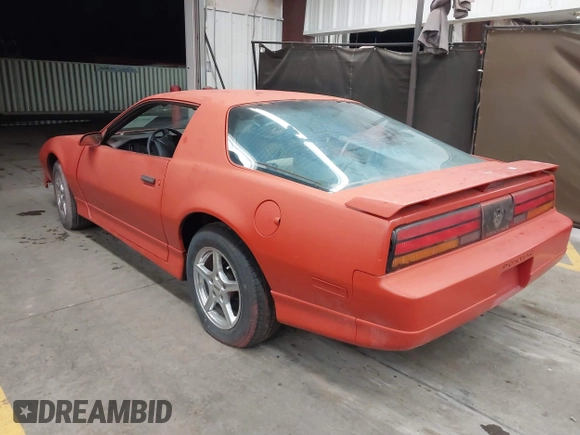 1990 Pontiac Firebird z VIN 1G2FS23T9LL219603, wystawiony jako IAAI lot #41774239 z przebiegiem 135 648 mil mil oraz . Historia ofert i sprzedaży dostępna na DreamBid. Obrazek 3.