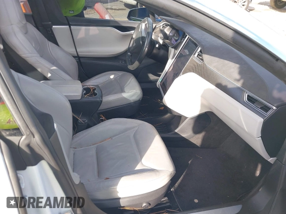 2016 Tesla Model S 90D with VIN 5YJSA1E21GF128460, listed as a IAAI auction lot 40733920 with 89,846 mi miles and . Bid and sale history available at DreamBid. Image 5.