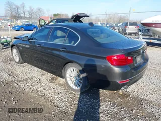 2014 BMW 5 Series 528i xDrive with VIN WBA5A7C54ED616297, listed as a IAAI auction lot 41877809 with 147,874 mi miles and . Bid and sale history available at DreamBid. Image 3.