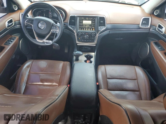 2015 Jeep Grand Cherokee Summit with VIN 1C4RJFJG6FC828922, listed as a Copart auction lot 54878415 with 125,781 mi miles and Salvage title. Bid and sale history available at DreamBid. Image 8.