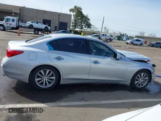2014 Infiniti Q50 Premium with VIN JN1BV7AP2EM679481, listed as a IAAI auction lot 41836371 with 133,393 mi miles. Bid and sale history available at carsss.com. Image 12.