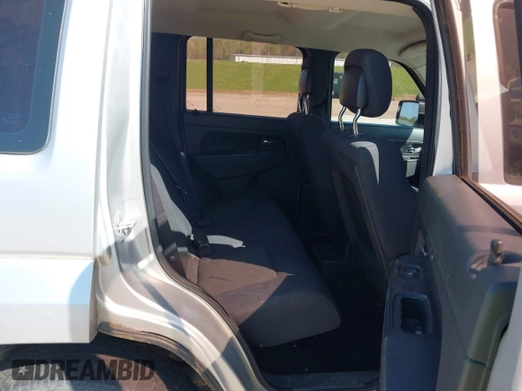 2011 Jeep Liberty Sport with VIN 1J4PN2GK6BW532799, listed as a IAAI auction lot 41985199 with 172,397 mi miles. Bid and sale history available at carsss.com. Image 8.