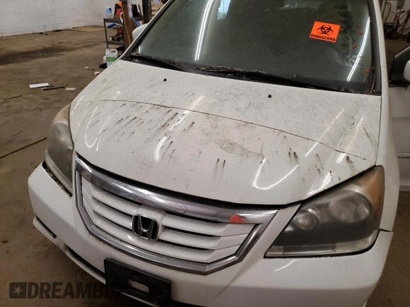 2010 Honda Odyssey EX-L z VIN 5FNRL3H7XAB024701, wystawiony jako Copart lot #56007685 z przebiegiem Nie podano mil oraz Nie do naprawy • Non repairable. Historia ofert i sprzedaży dostępna na DreamBid. Obrazek 12.