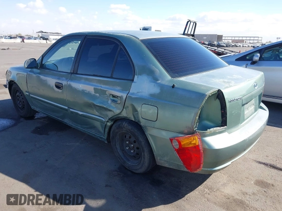 2005 Hyundai Accent GLS with VIN KMHCG45C95U620716, listed as a IAAI auction lot 41740573 with 187,971 mi miles. Bid and sale history available at carsss.com. Image 6.