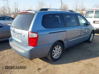 2010 Kia Sedona EX with VIN KNDMH4C38A6334878, listed as a IAAI auction lot 41772024 with 208,818 mi miles. Bid and sale history available at carsss.com. Image 4.
