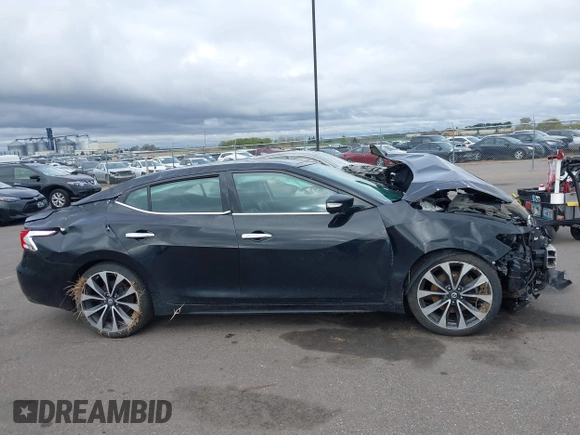 2016 Nissan Maxima SR z VIN 1N4AA6AP9GC386237, wystawiony jako IAAI lot #42166280 z przebiegiem 130 091 mil mil oraz . Historia ofert i sprzedaży dostępna na DreamBid. Obrazek 14.