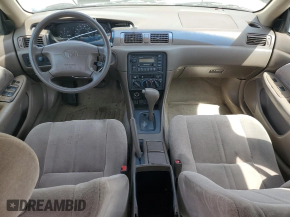 1999 Toyota Camry LE с VIN JT2BG22K6X0369818, выставлен на аукционе Copart как лот 54369385 с пробегом 246 320 миль миль и Списание • Salvage title. История ставок и продаж доступна на DreamBid. Изображение 8.