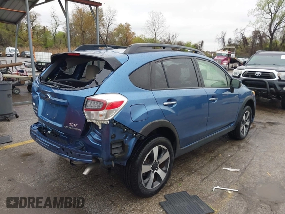 2015 Subaru Crosstrek Touring with VIN JF2GPBPC5FH299227, listed as a IAAI auction lot 41974814 with 45,464 mi miles and . Bid and sale history available at DreamBid. Image 4.