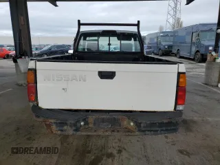 1995 Nissan Frontier with VIN 1N6SD11S3SC379478, listed as a Copart auction lot 52209415 with 21,068 mi miles and Salvage title. Bid and sale history available at DreamBid. Image 6.