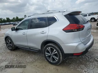 2017 Nissan Rogue S with VIN 5N1AT2MT2HC861133, listed as a Copart auction lot 54749085 with 86,705 mi miles and Salvage title. Bid and sale history available at DreamBid. Image 2.