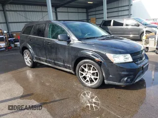 2013 Dodge Journey R/T with VIN 3C4PDCEG7DT682670, listed as a IAAI auction lot 42057985 with 221,755 mi miles and . Bid and sale history available at DreamBid. Image 1.