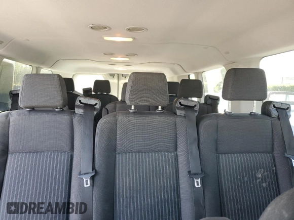 2018 Ford Transit Passenger XL z VIN 1FBZX2YM8JKA97299, wystawiony jako Copart lot #53553115 z przebiegiem 101 532 mil mil oraz Szkoda całkowita • Salvage title. Historia ofert i sprzedaży dostępna na DreamBid. Obrazek 10.