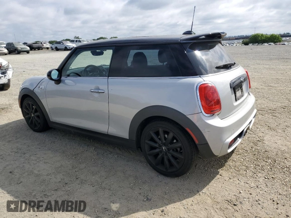 2016 MINI Hardtop S with VIN WMWXP7C54G2A42969, listed as a Copart auction lot 53910995 with 92,207 mi miles and Salvage title. Bid and sale history available at DreamBid. Image 2.