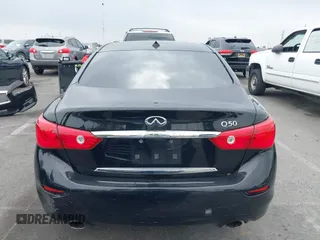 2015 Infiniti Q50 z VIN JN1BV7AP3FM336566, wystawiony jako IAAI lot #42349544 z przebiegiem 84 077 mil mil oraz . Historia ofert i sprzedaży dostępna na DreamBid. Obrazek 17.