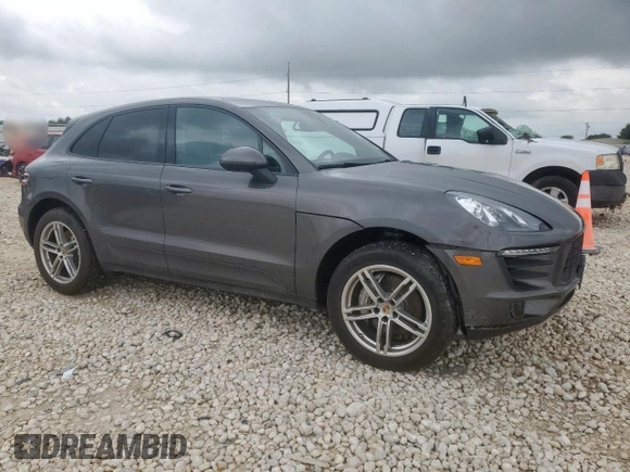 2015 Porsche Macan S with VIN WP1AB2A56FLB55310, listed as a Copart auction lot 63659615 with 43,444 mi miles and Salvage title. Bid and sale history available at DreamBid. Image 4.