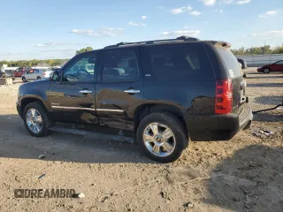 2010 Chevrolet Tahoe LTZ with VIN 1GNUKCE00AR105129, listed as a Copart auction lot 72955014 with 197,431 mi miles and Salvage title. Bid and sale history available at DreamBid. Image 2.