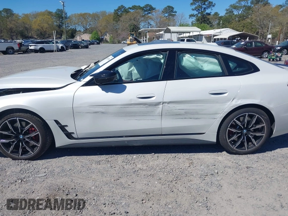 2024 BMW 4 Series M440i with VIN WBA63AW01RFS46965, listed as a IAAI auction lot 41879338 with 12,456 mi miles and . Bid and sale history available at carsss.com. Image 14.