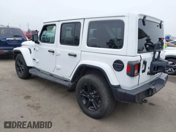2023 Jeep Wrangler Sahara with VIN 1C4HJXEG5PW581632, listed as a IAAI auction lot 42462622 with 24,550 mi miles and . Bid and sale history available at DreamBid. Image 3.