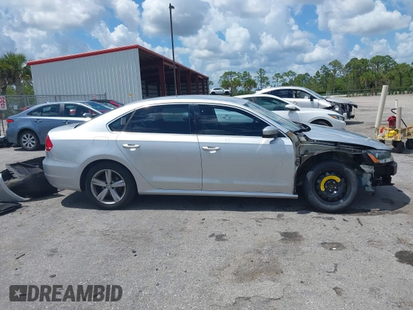 2015 Volkswagen Passat 1.8T Limited Edition with VIN 1VWAT7A35FC109653, listed as a IAAI auction lot 41917568 with 118,912 mi miles. Bid and sale history available at carsss.com. Image 13.