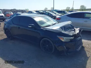 2015 Scion tC z VIN JTKJF5C77F3088781, wystawiony jako IAAI lot #42134209 z przebiegiem 62 509 mil mil oraz . Historia ofert i sprzedaży dostępna na DreamBid. Obrazek 1.