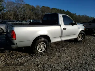 2002 Ford F-150 XL with VIN 1FTRF17202NB11513, listed as a Copart auction lot 85773084 with 120,443 mi miles and Salvage Title. Bid and sale history available at carsss.com. Image 3.