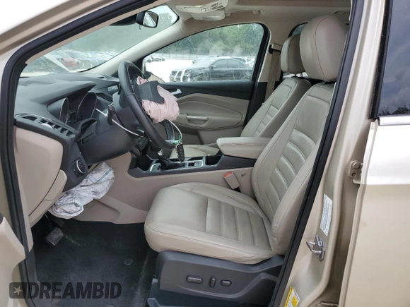 2017 Ford Escape Titanium with VIN 1FMCU0J95HUB96659, listed as a Copart auction lot 54053775 with 69,744 mi miles and Salvage Title. Bid and sale history available at DreamBid. Image 7.
