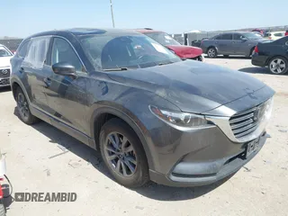 2021 Mazda CX-9 Touring with VIN JM3TCACY2M0502016, listed as a IAAI auction lot 41825456 with 86,068 mi miles. Bid and sale history available at carsss.com. Image 1.
