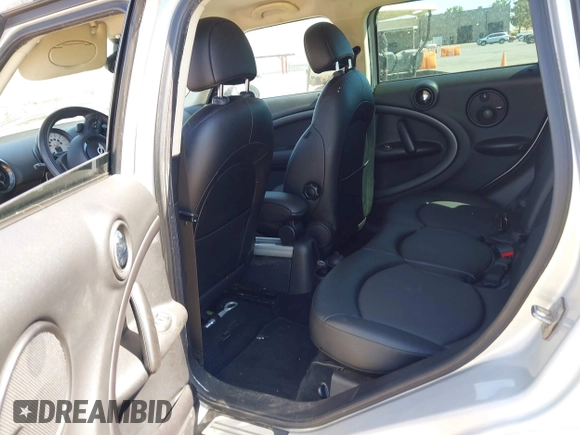 2014 MINI Countryman S with VIN WMWZC5C54EWP40882, listed as a IAAI auction lot 42633141 with 176,641 mi miles and . Bid and sale history available at DreamBid. Image 8.