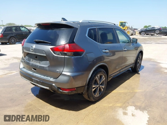 2017 Nissan Rogue SL with VIN JN8AT2MT2HW407004, listed as a IAAI auction lot 41884121 with 79,227 mi miles and . Bid and sale history available at DreamBid. Image 4.
