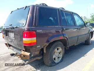 1997 Jeep Grand Cherokee Laredo with VIN 1J4GZ58S0VC708420, listed as a IAAI auction lot 42624603 with Not provided miles and . Bid and sale history available at DreamBid. Image 11.